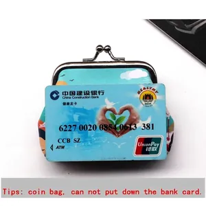 Retro light blue flamingo coin purse with metal clasp and scenic cloud pattern