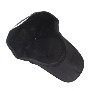 Black cotton baseball cap with adjustable strap and breathable interior headband