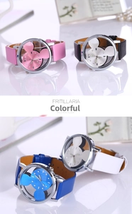 Close-up of fashion quartz watches with Mickey-shaped hollow dials and rhinestones