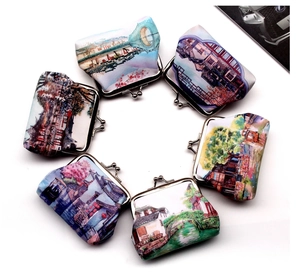 Detailed flat lay of six vintage coin purses with traditional Chinese landscape prints