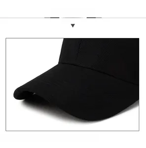 Detail of reinforced brim on black baseball cap showing structural sandwich layer