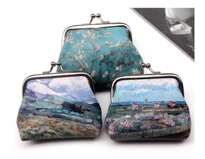 Detail of vintage metal clasp purse set featuring Van Gogh oil painting art prints