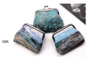 Detail of vintage coin purses with Van Gogh oil painting prints and metal clasp closure