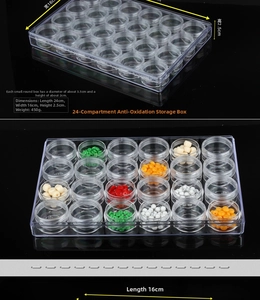 Detailed view of 24-grid acrylic organizer with small round containers for jewelry beads