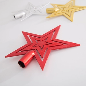 Detailed close-up of red, gold, and silver star tree toppers with glossy electroplated finish