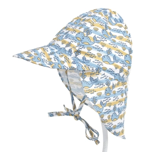 Detail of baby sun hat with neck flap featuring cartoon whale prints and wave patterns