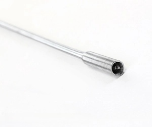Detailed close-up of smooth flexible steel spring drain clog remover tool for pipes