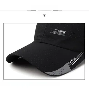Close-up of black breathable mesh fabric and sports fashion prints on the sun hat