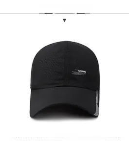 Macro shot of breathable black mesh fabric and printed sports lettering on the cap