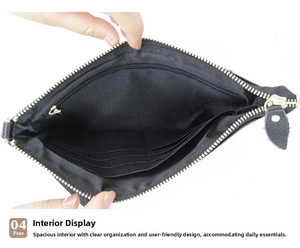 Detail of genuine leather clutch interior with card slots and a secure zipper pocket
