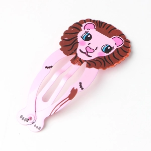 Close-up of pink metal BB hair clip featuring a cute cartoon lion with brown mane