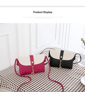 Detail showing two-tone mini crossbody bags with decorative golden deer charms