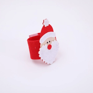 Close-up of red felt Santa Claus napkin ring with white beard for Christmas table decor