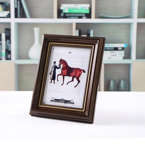 Retro dark brown wooden photo frame with gold inner border and equestrian artwork display