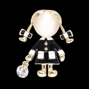 Cute girl cartoon brooch with white pearl head and black enamel outfit on black background
