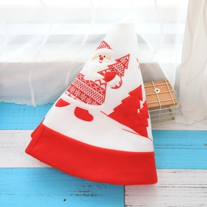 Christmas tree skirt with red white embroidery of Santa Claus and tree on wooden background