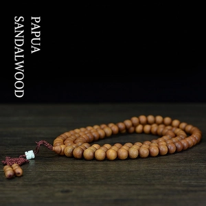Barbie Sandalwood 108 prayer beads bracelet with natural wood grain and red knot