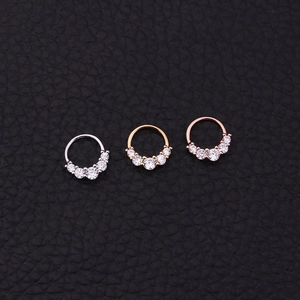 Tribal septum nose rings in silver gold and rose gold with zircon stone accents