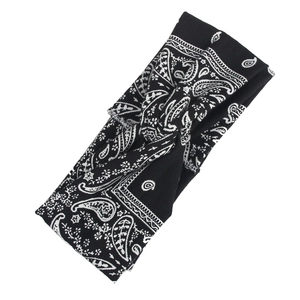 Bohemian black and white paisley print headband with a stylish twist knot design