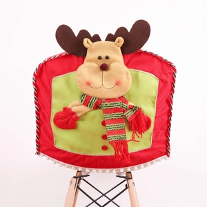 Christmas reindeer chair cover in red and green fabric with 3D antlers and scarf