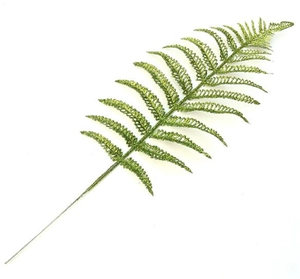 Close-up of artificial fern leaf with green glitter finish for Christmas decoration
