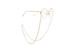Detail of round gold metal glasses with matching decorative chain in floating 45-degree view