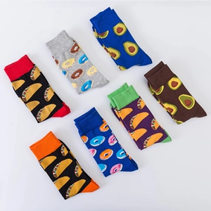 Set of eight colorful cotton crew socks featuring avocado, donut, and taco food patterns