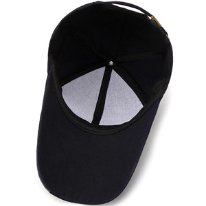 Deep blue baseball cap shown with interior stitching details and metal adjustment buckle