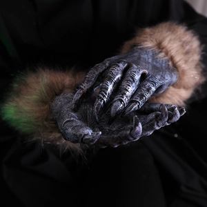 Close-up of realistic werewolf claws with brown fur for Halloween monster costumes