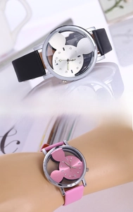 Detail showing the Mickey Mouse hollow design with rhinestone markers on quartz watch