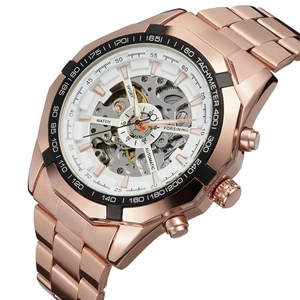 Macro shot of rose gold skeleton dial and automatic mechanical movement on Forsining watch