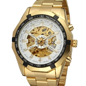 Detailed close-up of golden automatic mechanical watch featuring a full skeleton dial design