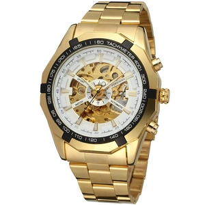 Detail of the golden automatic mechanical watch featuring a skeleton dial and tachymeter bezel