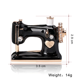 Enamel sewing machine brooch with rhinestones and dimensions 3.5cm by 2.9cm