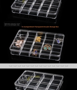 Detailed view of 15-compartment clear acrylic storage box showing 25x17.5x3.5cm dimensions