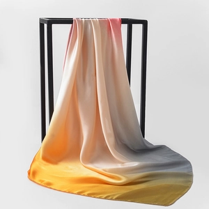 Detail of satin gradient scarf showing silk-like texture and smooth color transition