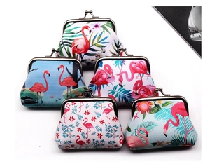 Detailed stack of five flamingo print coin purses with vintage metal clasp closure