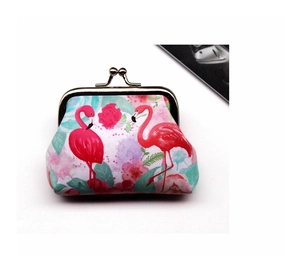 Detailed view of flamingo and rose print kiss-lock coin purse with metal clasp