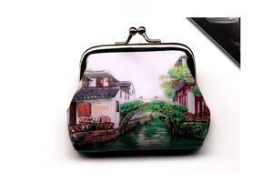 Detail of vintage canvas coin purse with ancient town print and gold clasp