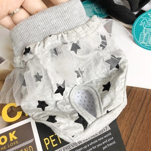 Detail view of pet sanitary pants with breathable mesh lining and tail hole design