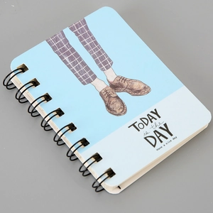 Detail of A7 mini spiral notebook with light blue cover and black wire-o binding