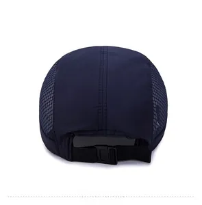 Detail of the navy mesh baseball cap featuring an adjustable back strap and plastic buckle