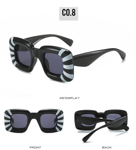 Detailed multi-angle view of Y2K sunglasses with black frame and white stripe accents