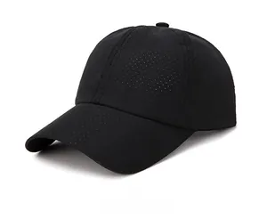 Detail view of the laser-cut perforated breathable mesh fabric on black baseball cap