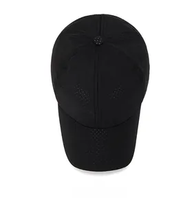 Top view of a black quick-dry mesh cap showing breathable 6-panel structure details