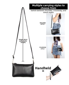 Detail of black pebbled leather envelope bag with adjustable 60cm crossbody strap