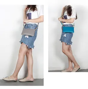 Slim leather envelope crossbody bag with litchi grain texture in grey and blue colors