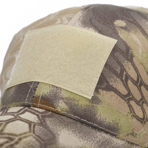 Detailed close-up of tactical camo hat featuring a front hook and loop patch area