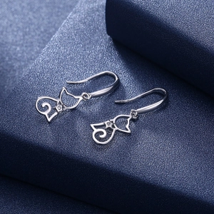 Minimalist S925 sterling silver cat silhouette earrings with zircon on a blue base