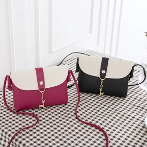 Mini crossbody bags with gold deer pendants in wine red and black contrast colors